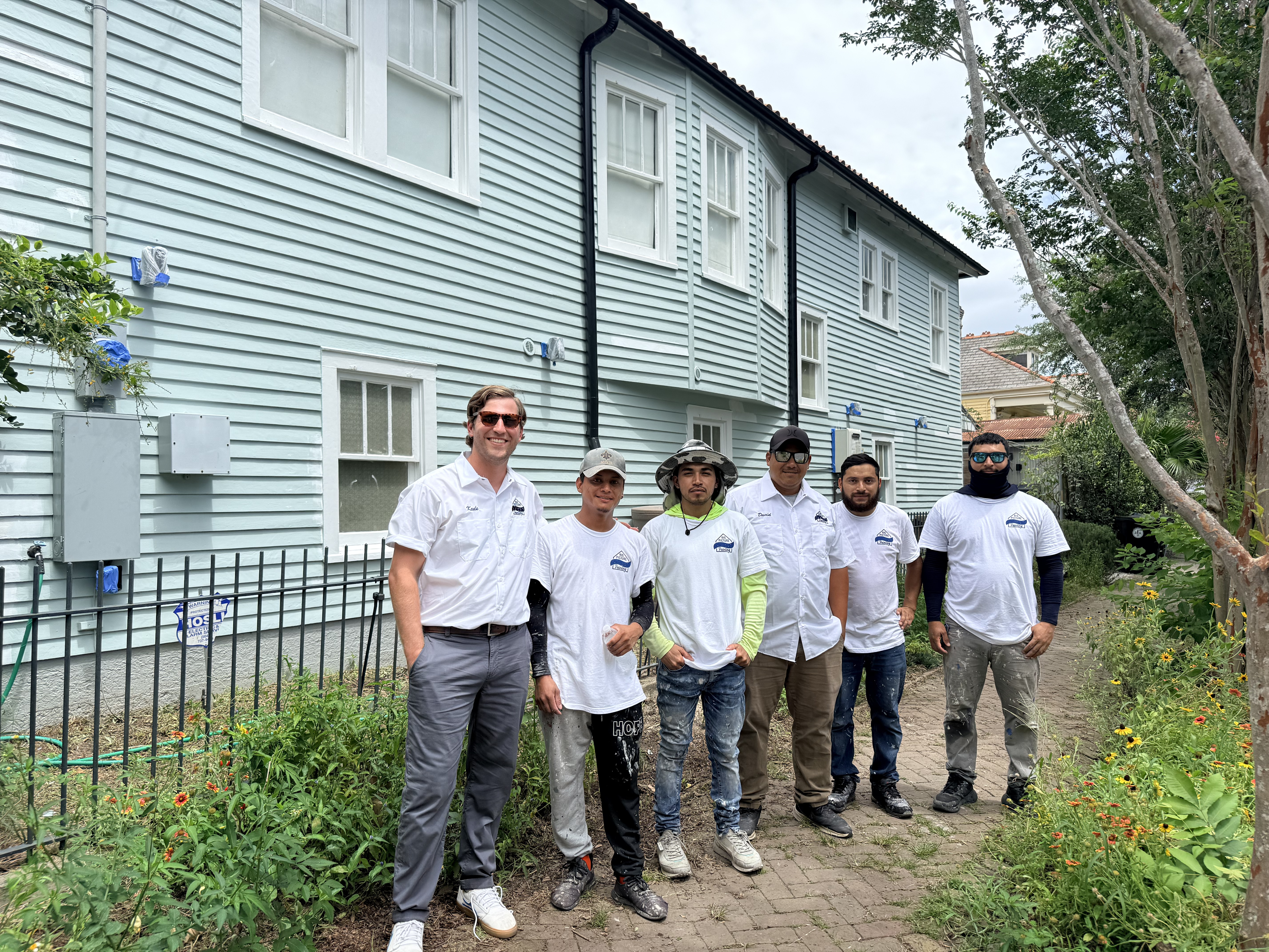Big Picture Painting crew member working on a home exterior