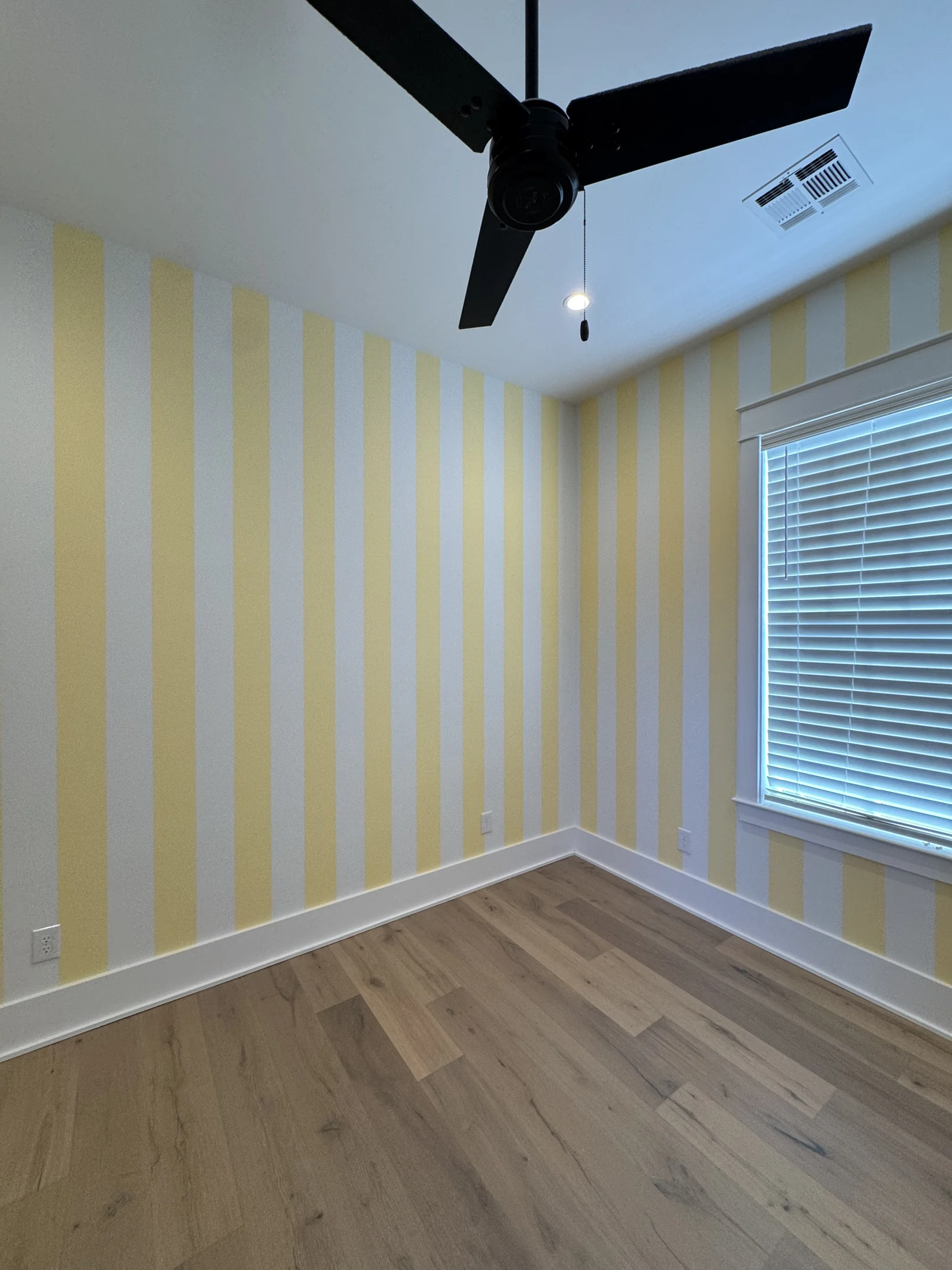 Finished interior space with fresh paint throughout